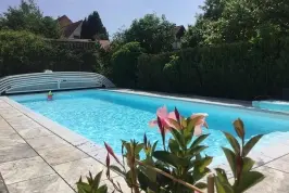 Pool München Garten mit Poolüberdachung